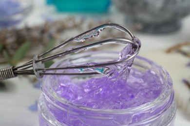 Photo of Homemade lavender gel and whisk, closeup view