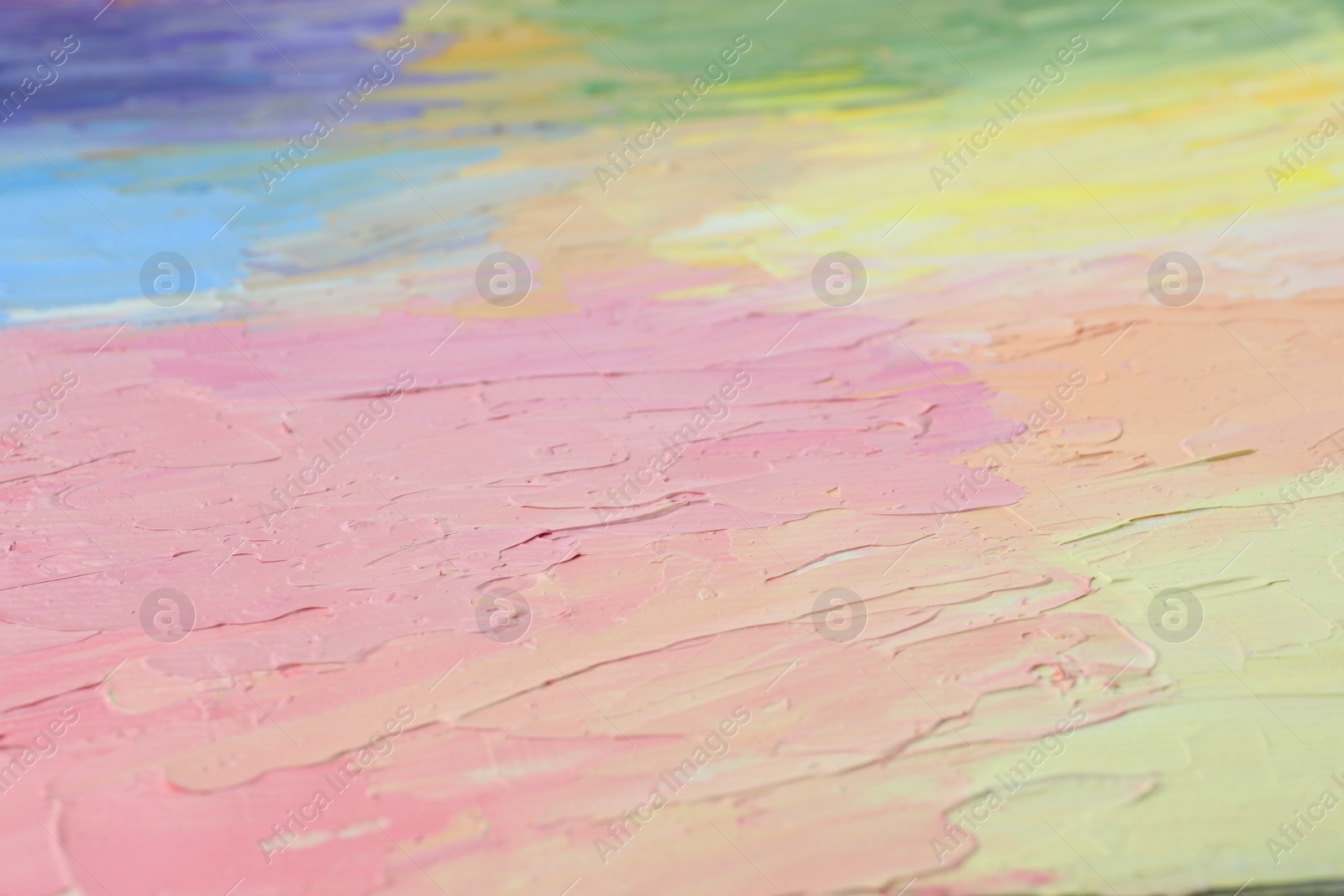 Photo of Beautiful strokes of pastel oil paints as background, closeup