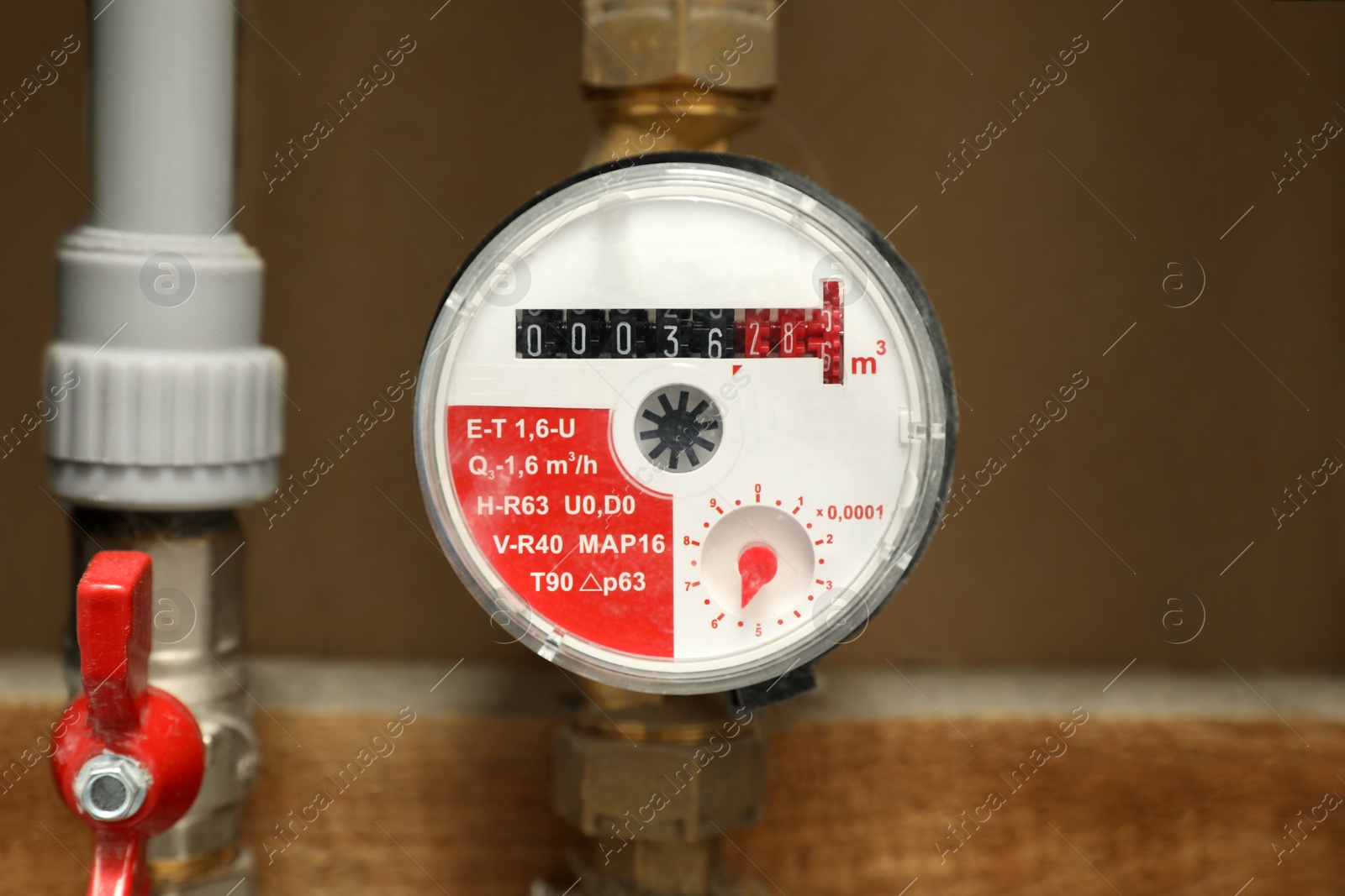 Photo of Electric meter in fuse box, space for text. Water measuring device