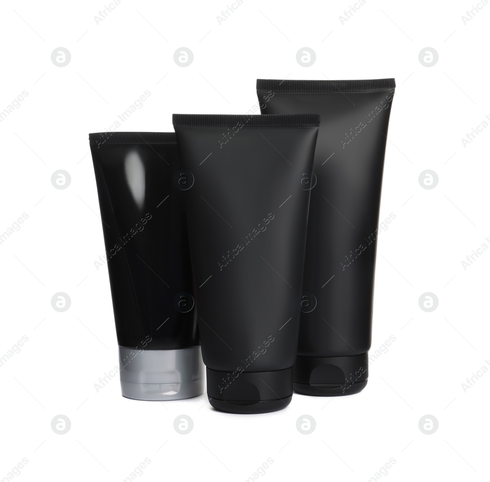 Photo of Tubes of men's facial creams on white background. Mockup for design