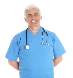 Portrait of male doctor in scrubs with stethoscope isolated on white. Medical staff