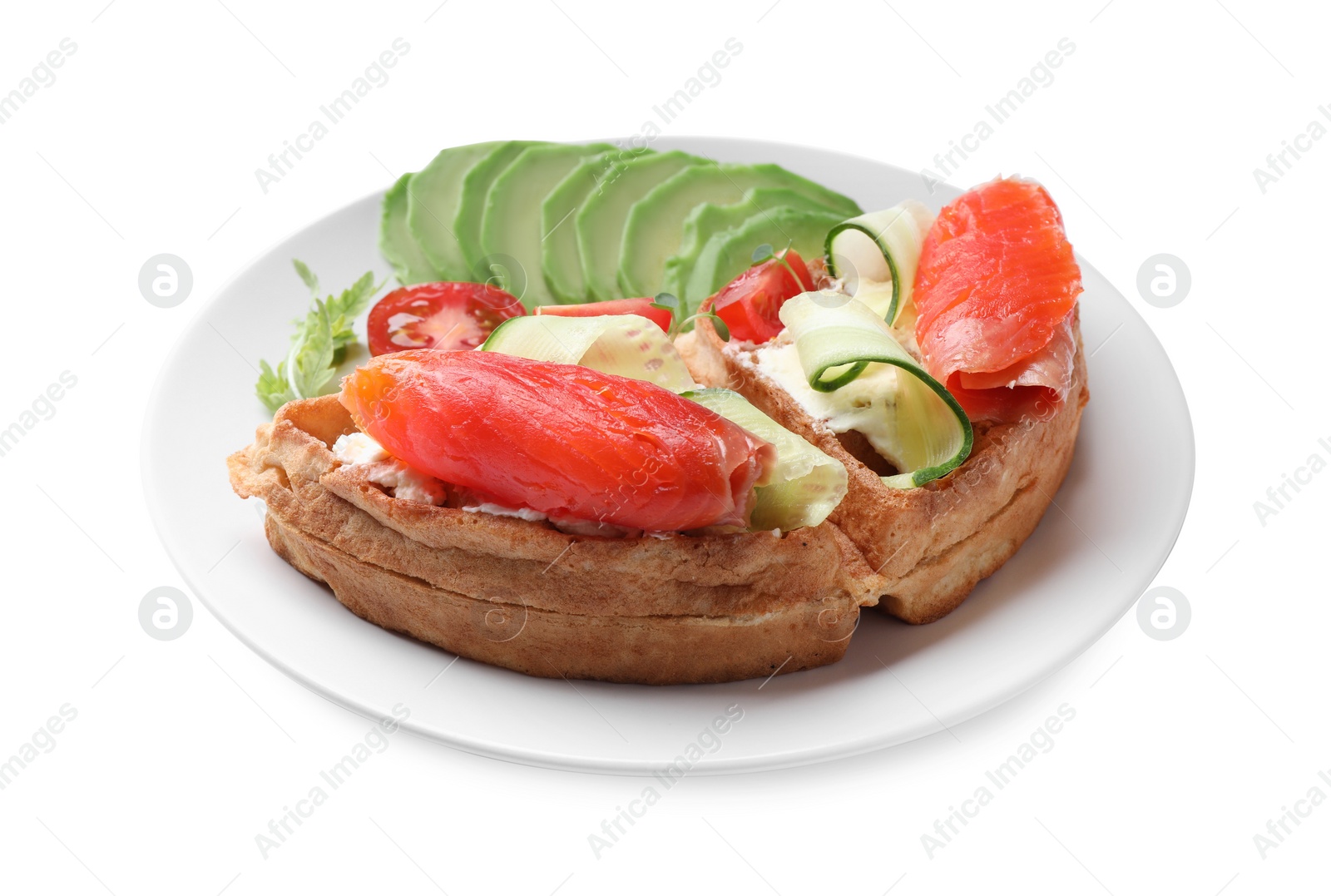 Photo of Delicious Belgian waffle with salmon, avocado, cream cheese and vegetables on white background