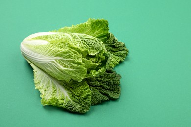 Photo of Fresh ripe Chinese cabbage on green background