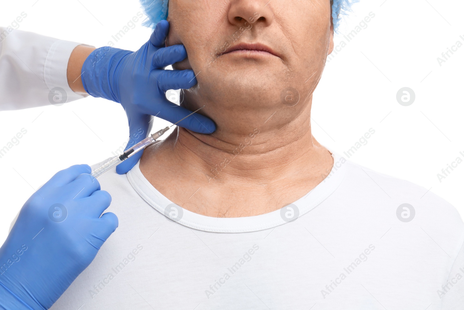 Photo of Mature man with double chin receiving injection on white background, closeup