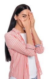 Photo of Embarrassed young woman covering face with hands on white background