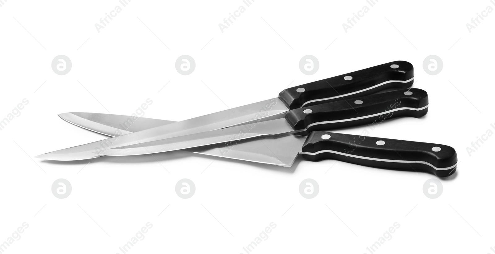 Photo of Modern sharp kitchen knives isolated on white