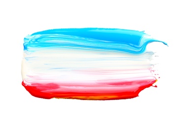 Photo of Abstract brushstroke of mixed color paint isolated on white