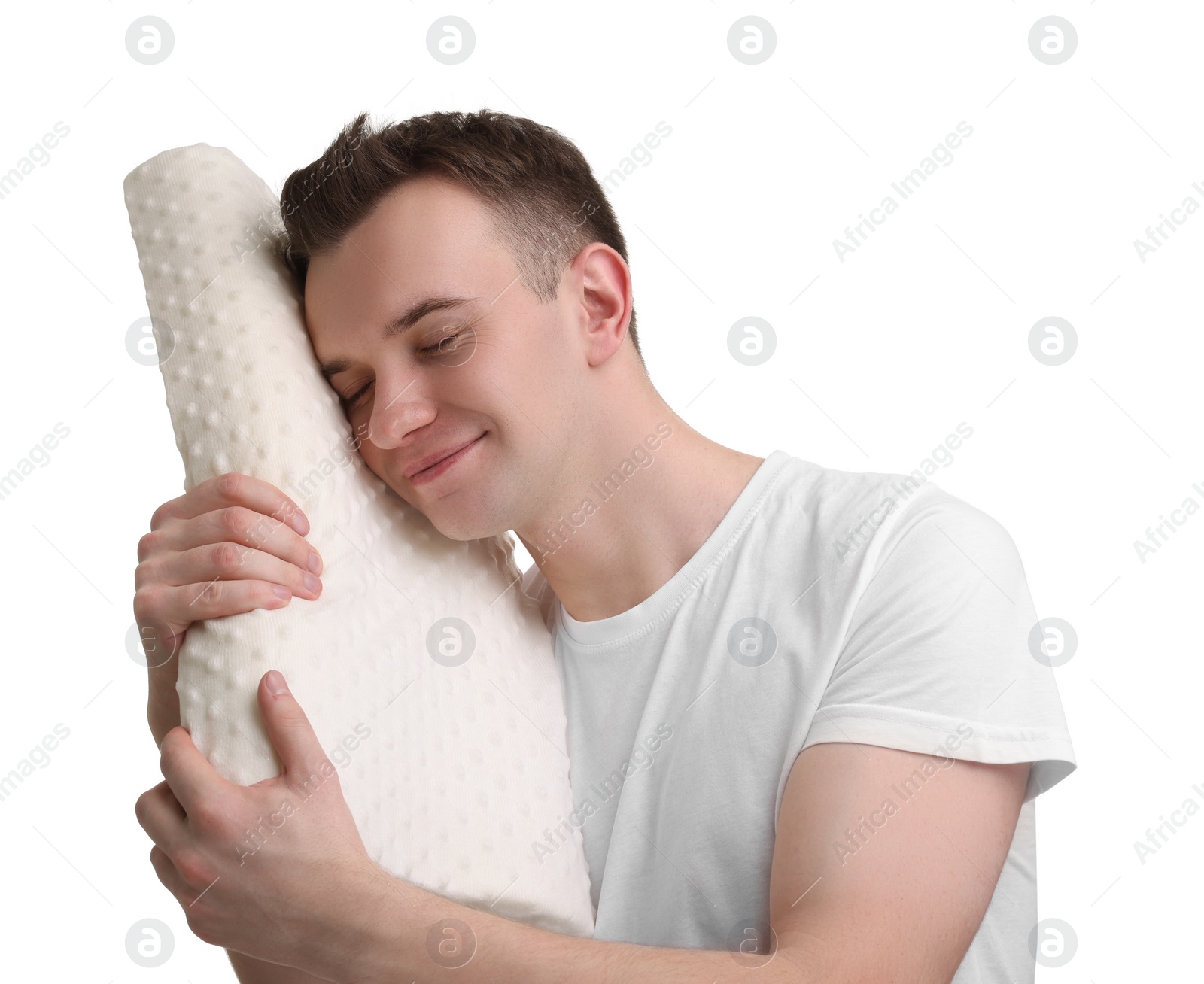 Photo of Man with orthopedic pillow on white background