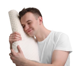 Photo of Man with orthopedic pillow on white background