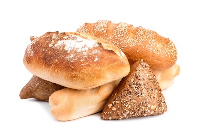 Photo of Loaves of different breads on white background