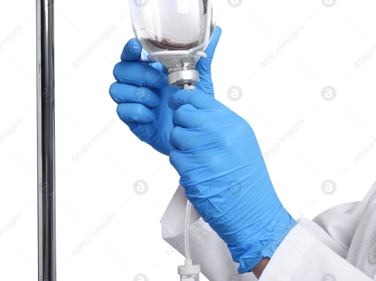 Photo of Nurse setting up IV drip on white background, closeup