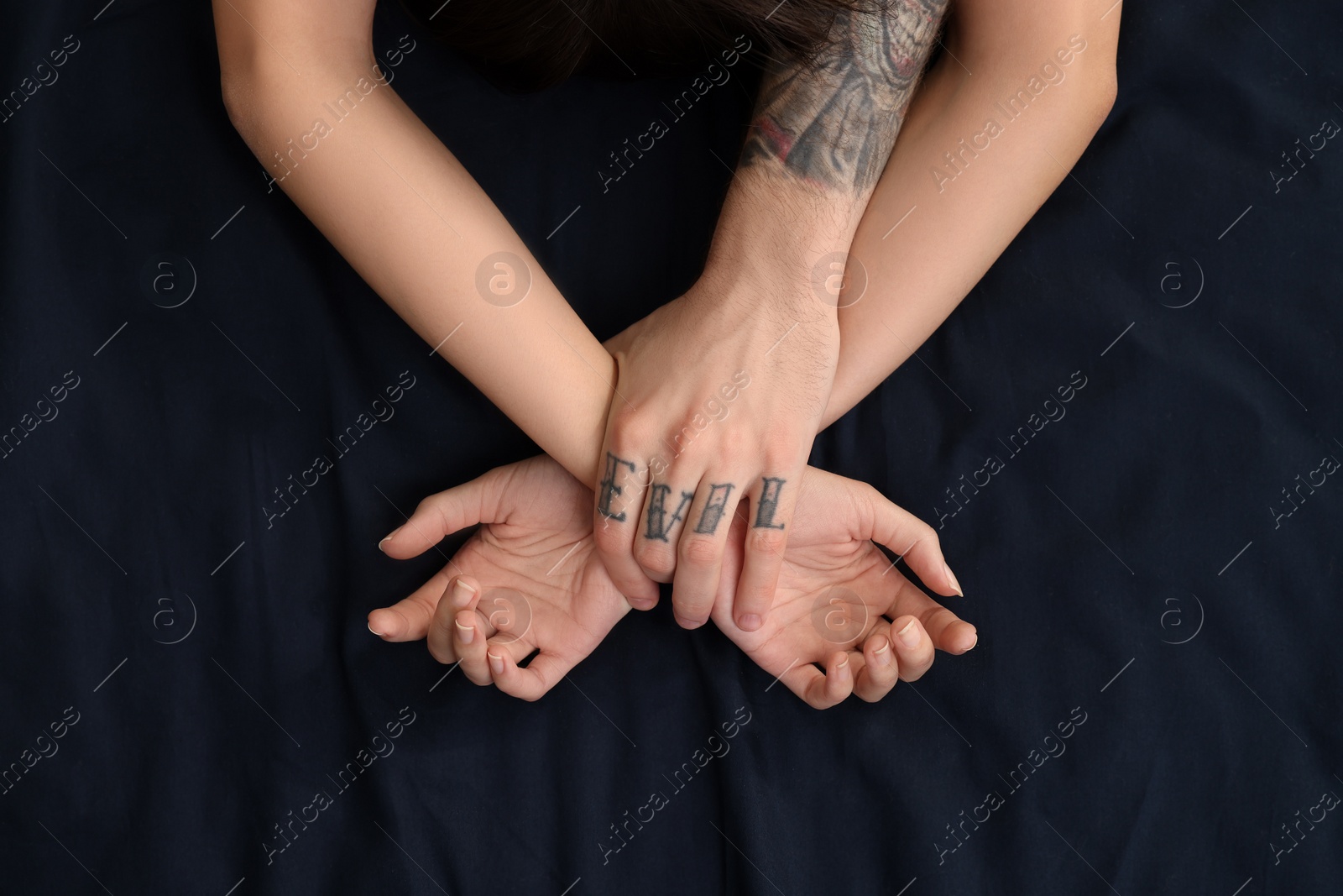 Photo of Passionate couple having sex on bed, top view