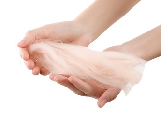 Photo of Woman holding beige felting wool on white background, closeup