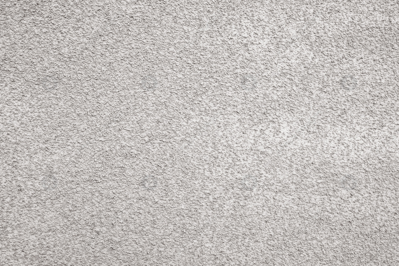 Photo of Texture of grey plaster wall as background