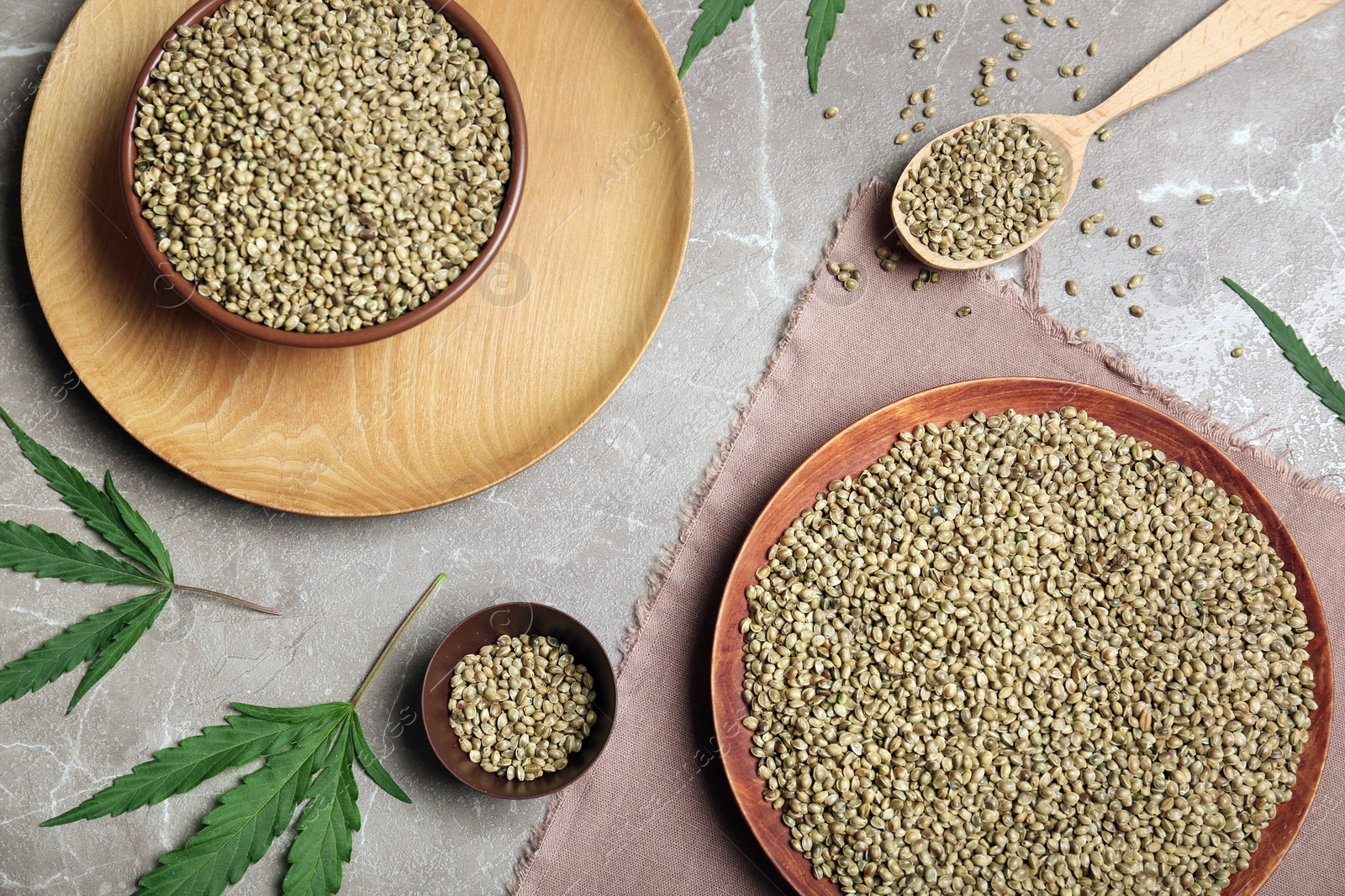 Photo of Flat lay composition with hemp seeds on grey background