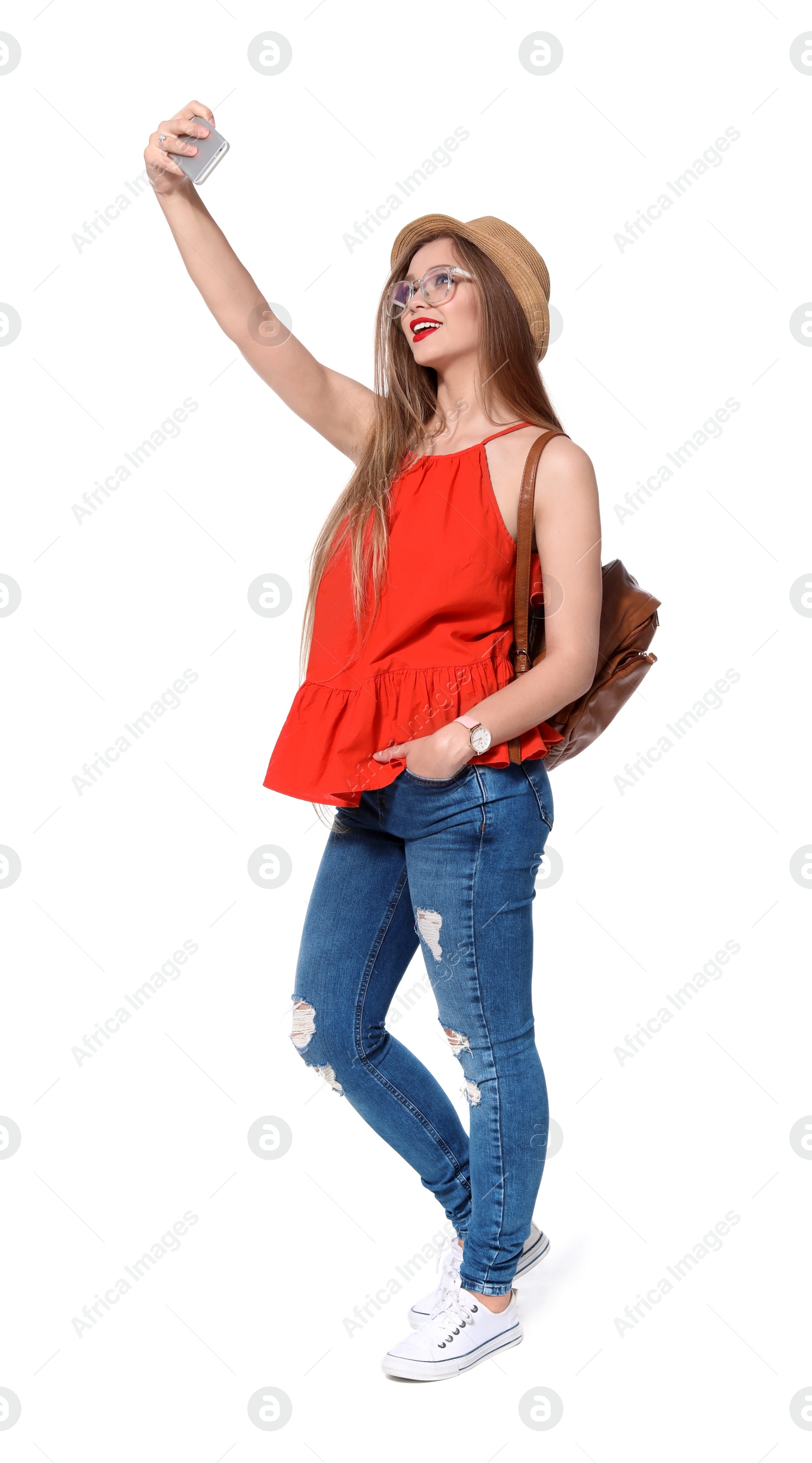 Photo of Attractive young woman taking selfie on white background