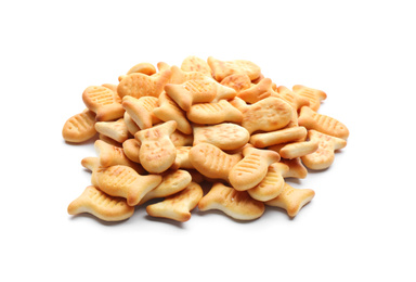 Photo of Delicious crispy goldfish crackers on white background