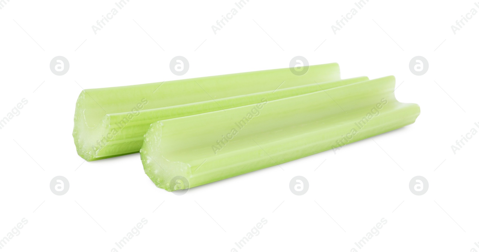 Photo of Fresh green cut celery isolated on white