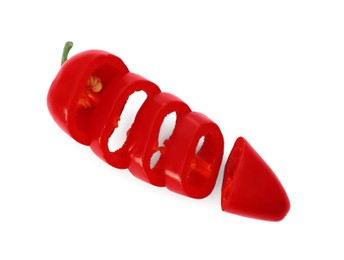 Photo of Cut red hot chili pepper isolated on white, top view