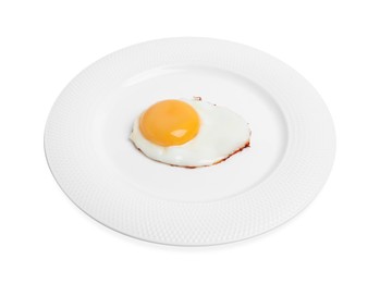 Plate with delicious fried egg isolated on white