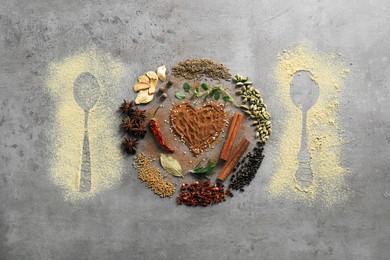 Flat lay composition with different spices and silhouettes of spoons on grey textured table