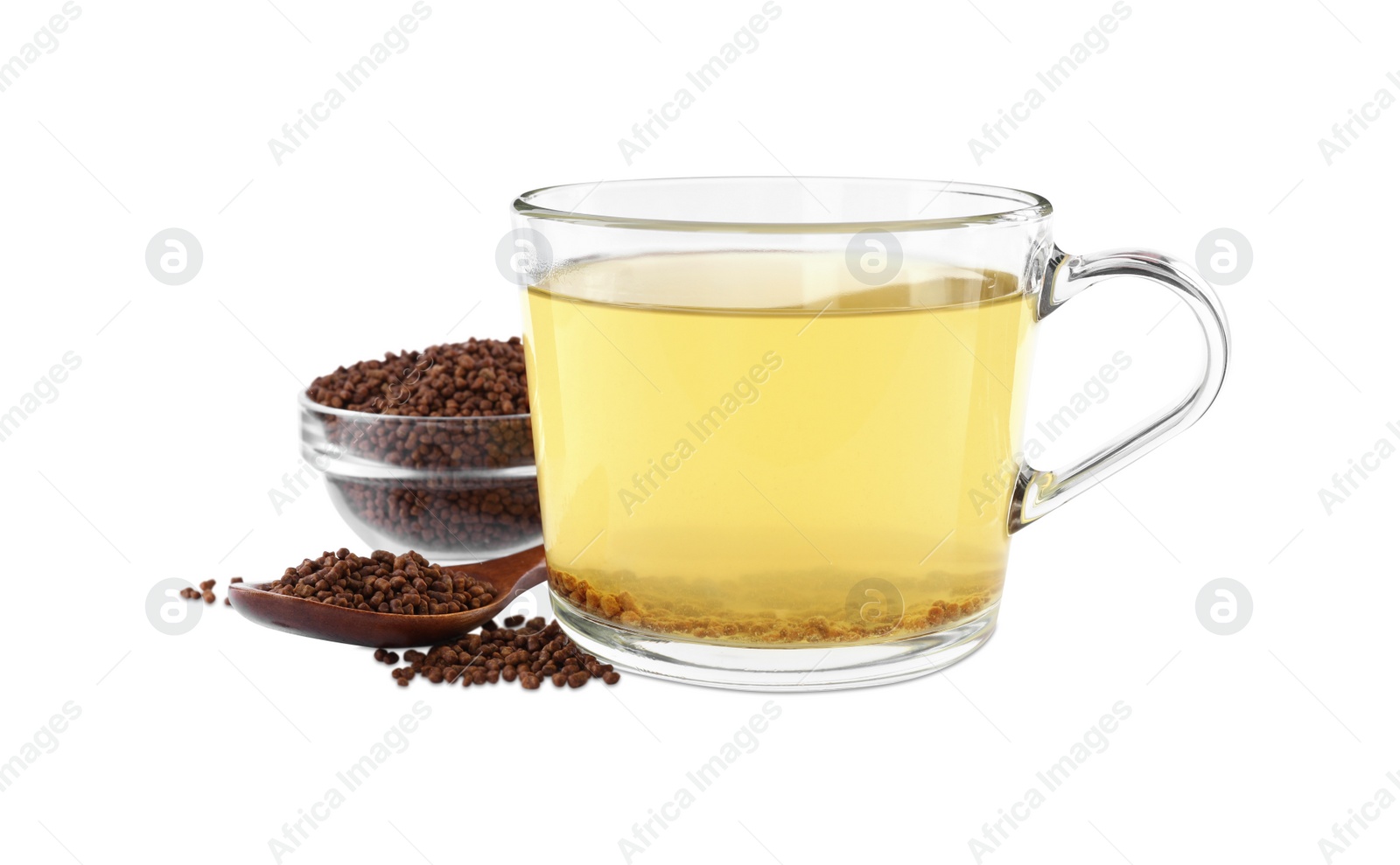Photo of Cup of aromatic buckwheat tea and granules on white background