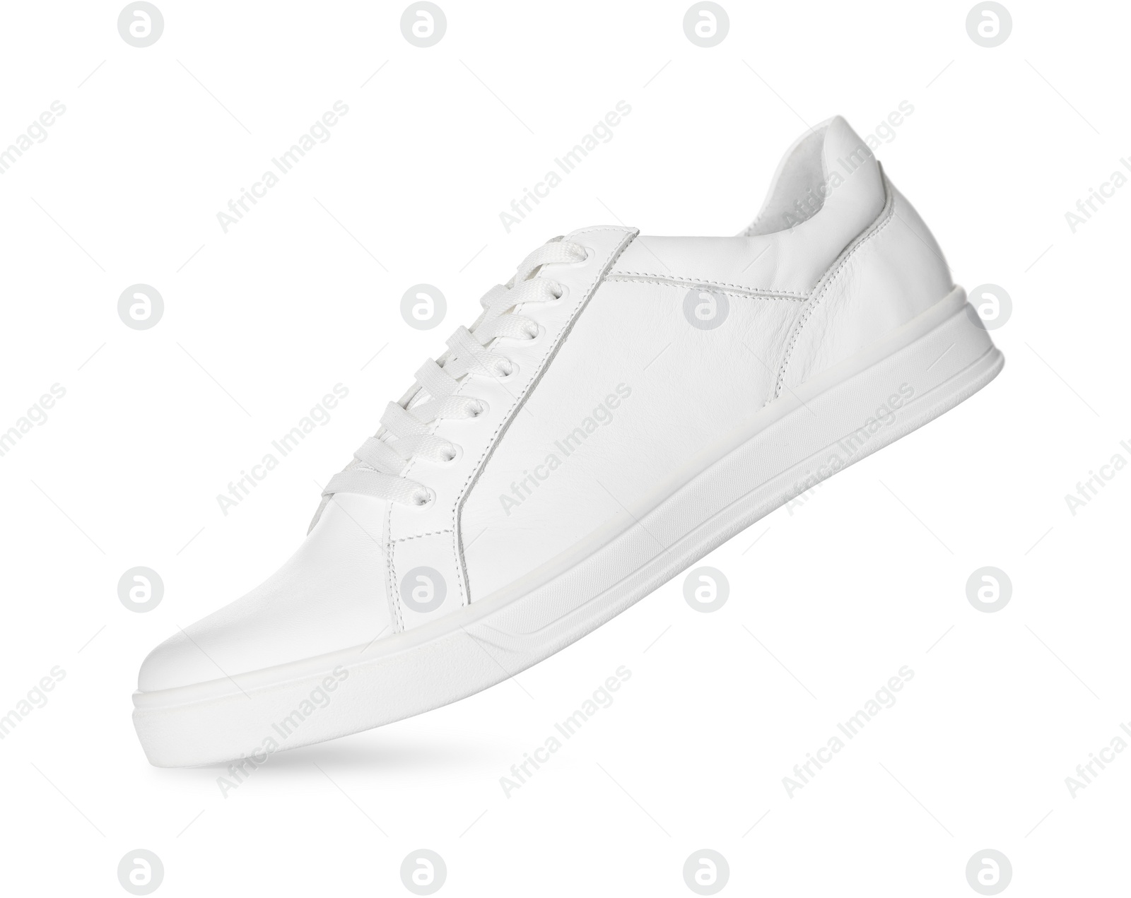 Photo of One stylish sneaker isolated on white. Comfortable footwear