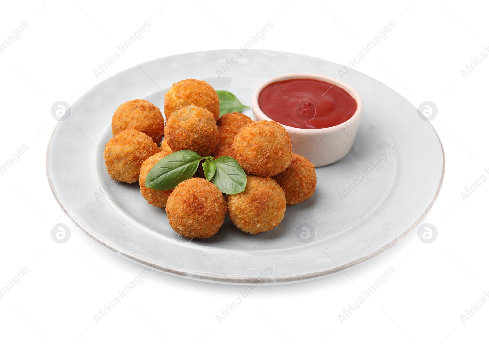 Photo of Plate with delicious fried tofu balls and basil on white background