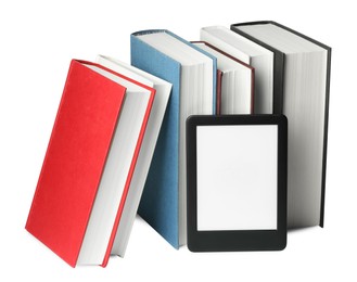 Hardcover books and modern e-book isolated on white
