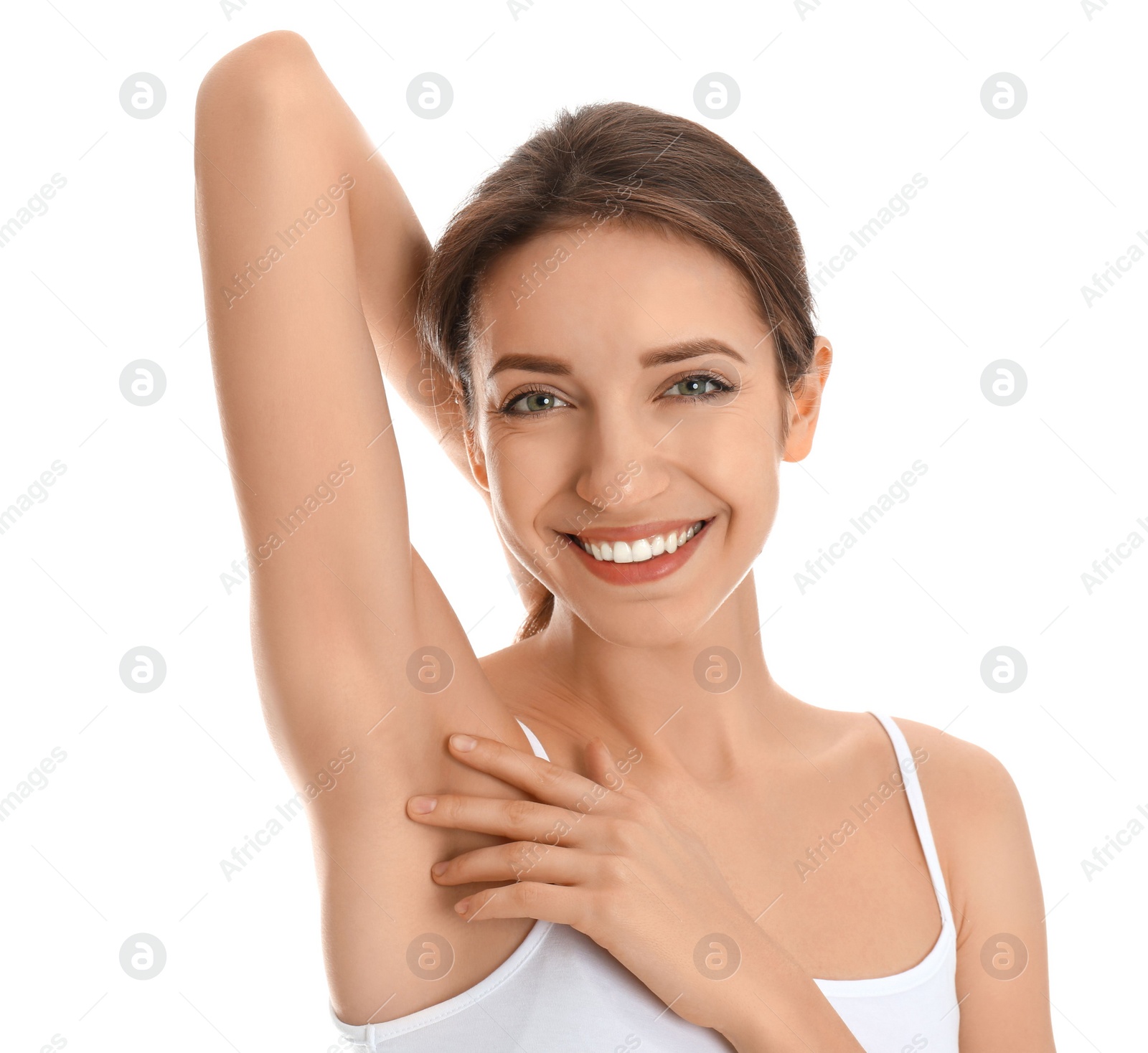 Photo of Young woman showing armpit with smooth clean skin on white background