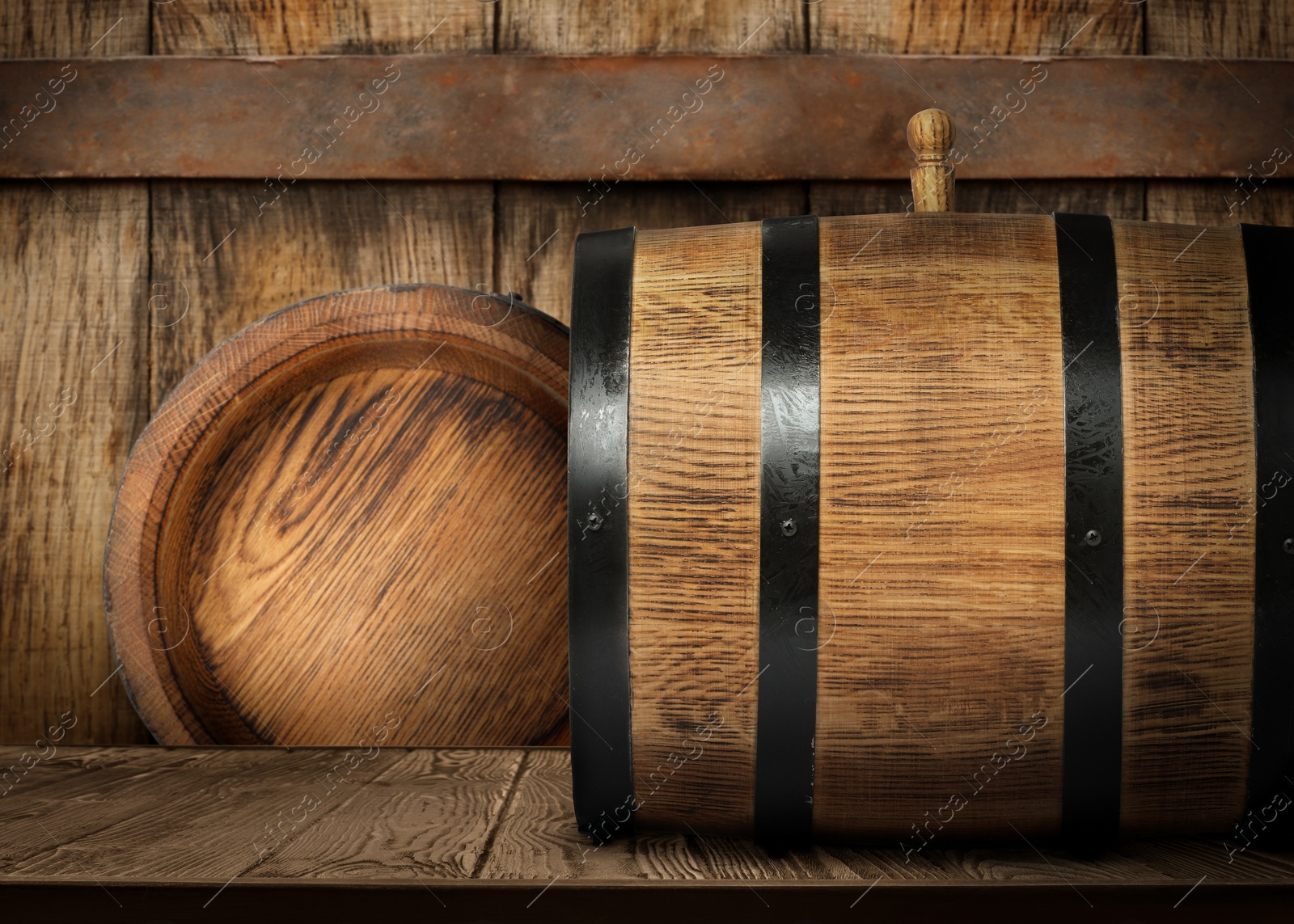 Image of Wooden barrels of different sizes in cellar