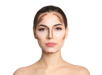 Young woman with contouring lines on her face against white background. Professional makeup products