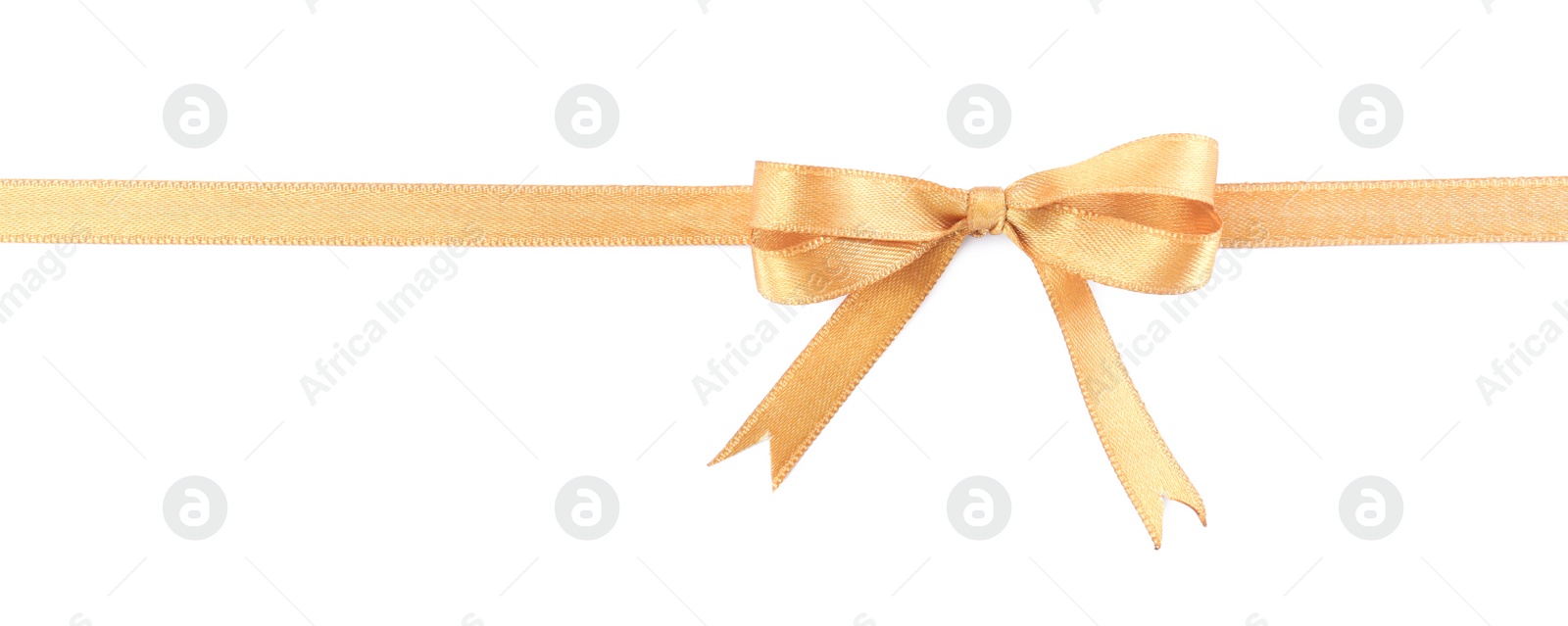 Photo of Golden satin ribbon with bow on white background, top view