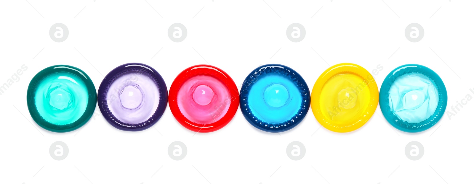 Photo of Colorful condoms isolated on white, top view. Safe sex