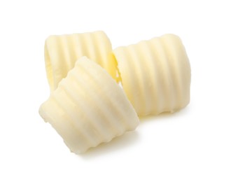 Photo of Three tasty butter curls isolated on white