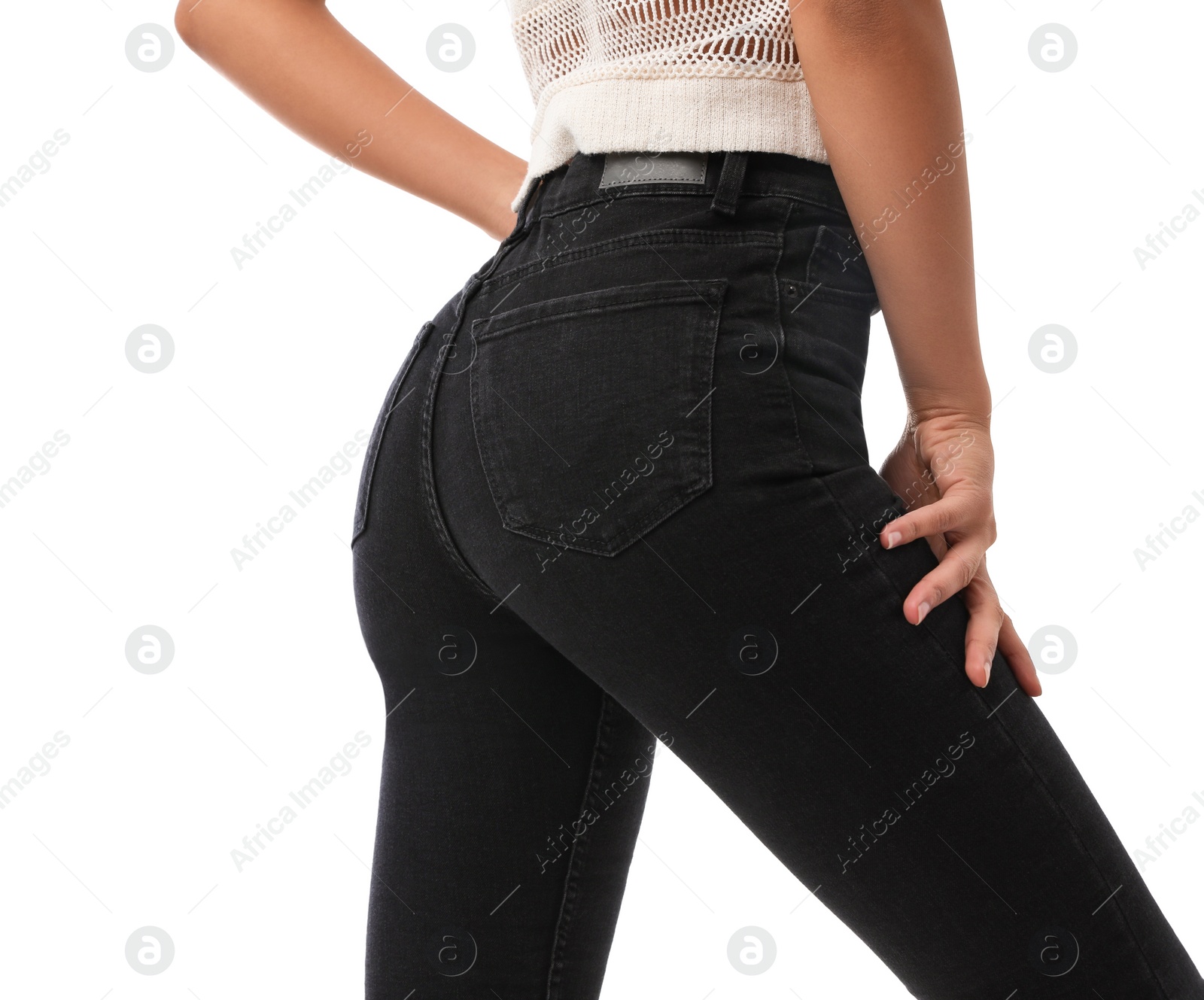 Photo of Woman wearing jeans on white background, closeup