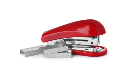 Photo of Bright red stapler with staples isolated on white