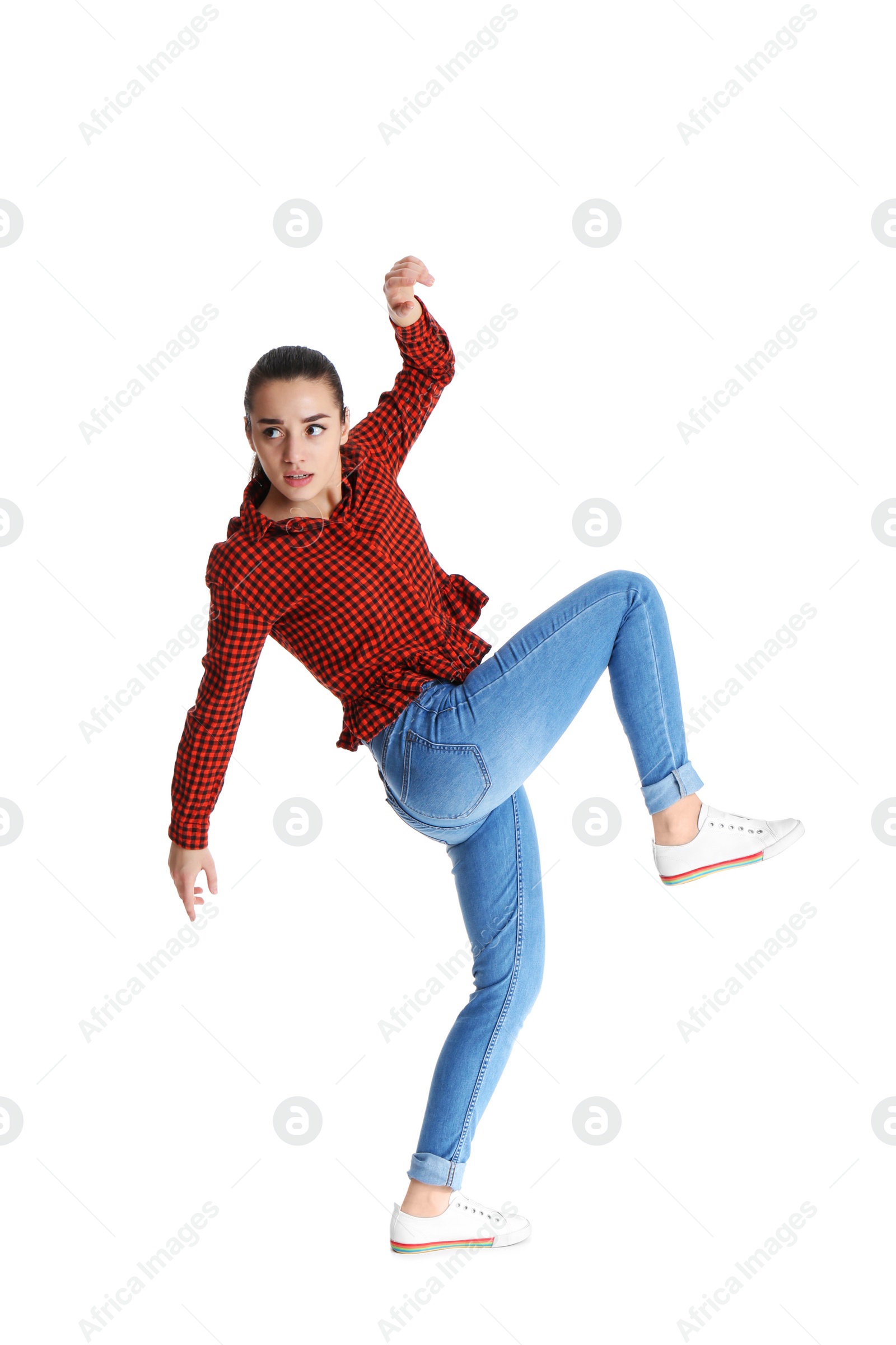 Photo of Young woman attracted to magnet on white background