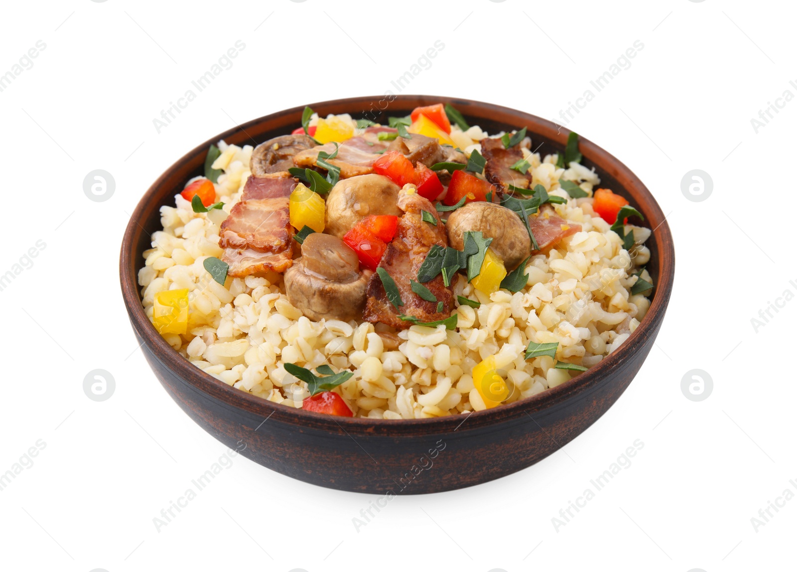 Photo of Cooked bulgur with vegetables, fried bacon and mushrooms in bowl isolated on white