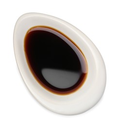 Tasty soy sauce in gravy boat isolated on white, top view