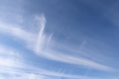 Beautiful fluffy white clouds in blue sky