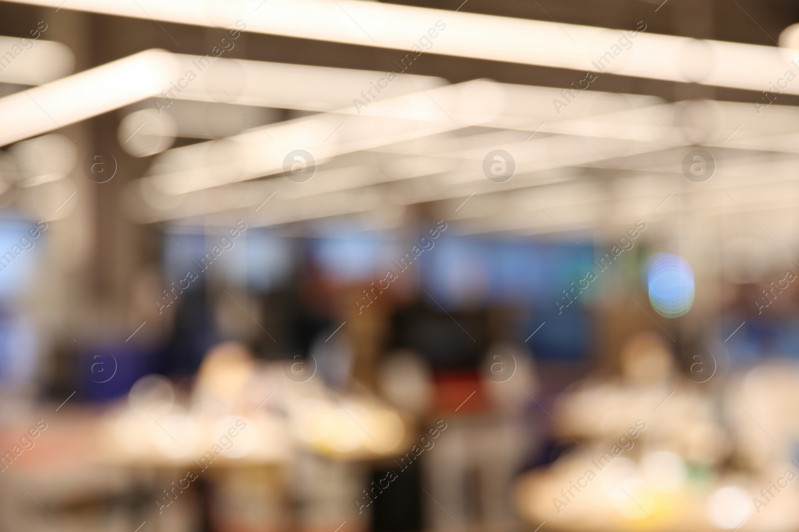 Photo of Blurred view of stylish modern cafe interior