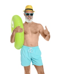 Photo of Shirtless man with inflatable ring on white background