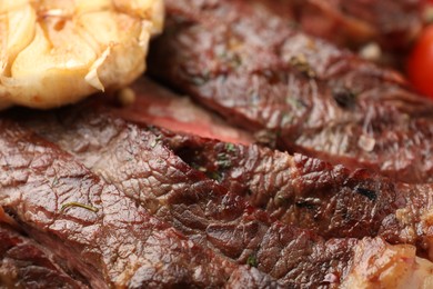 Delicious grilled beef with spices, closeup view