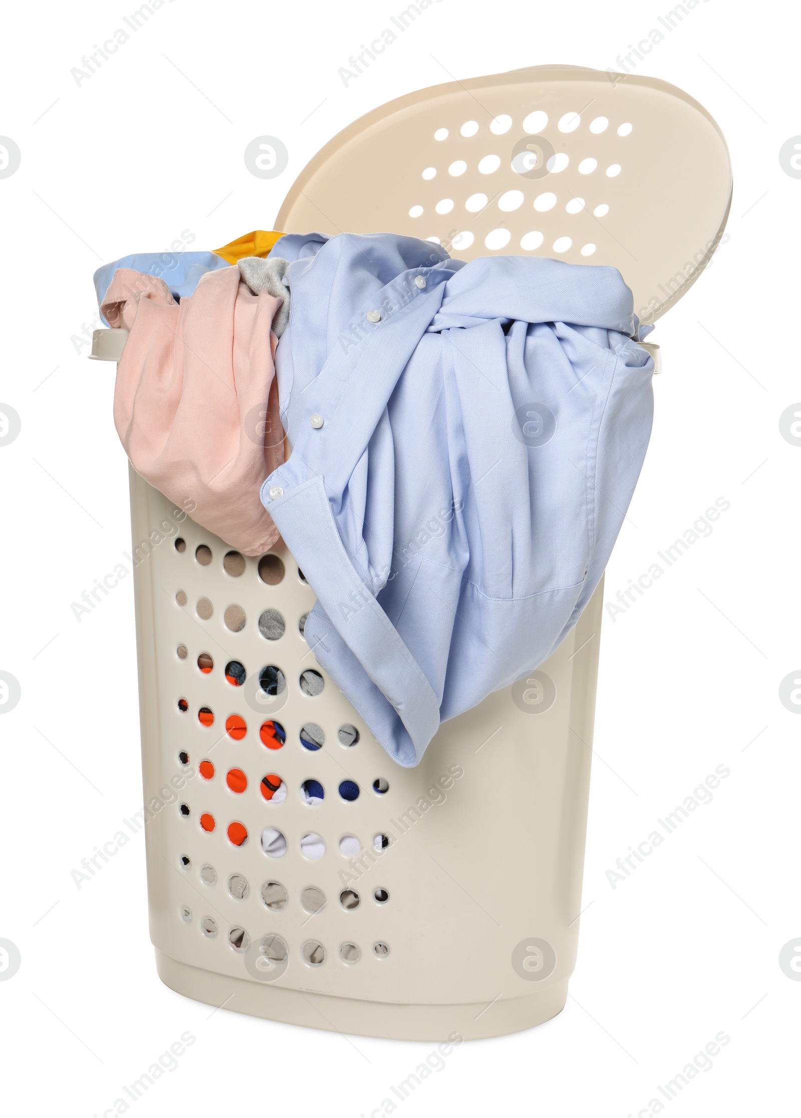 Photo of Plastic laundry basket full of clothes isolated on white