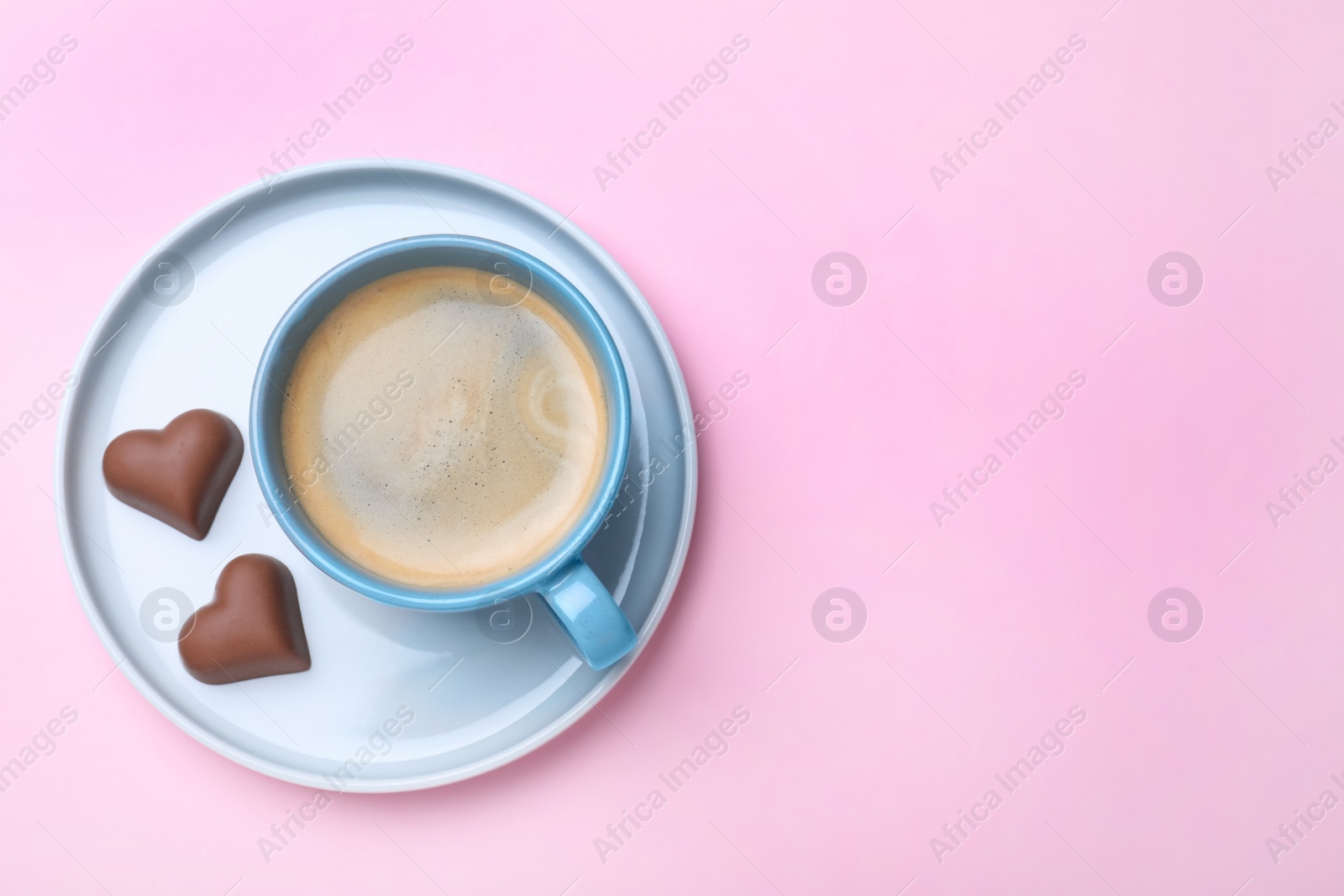 Photo of Romantic breakfast on pink background, top view with space for text. Valentine's day celebration