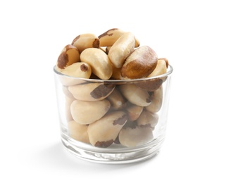 Photo of Glass with Brazil nuts on white background