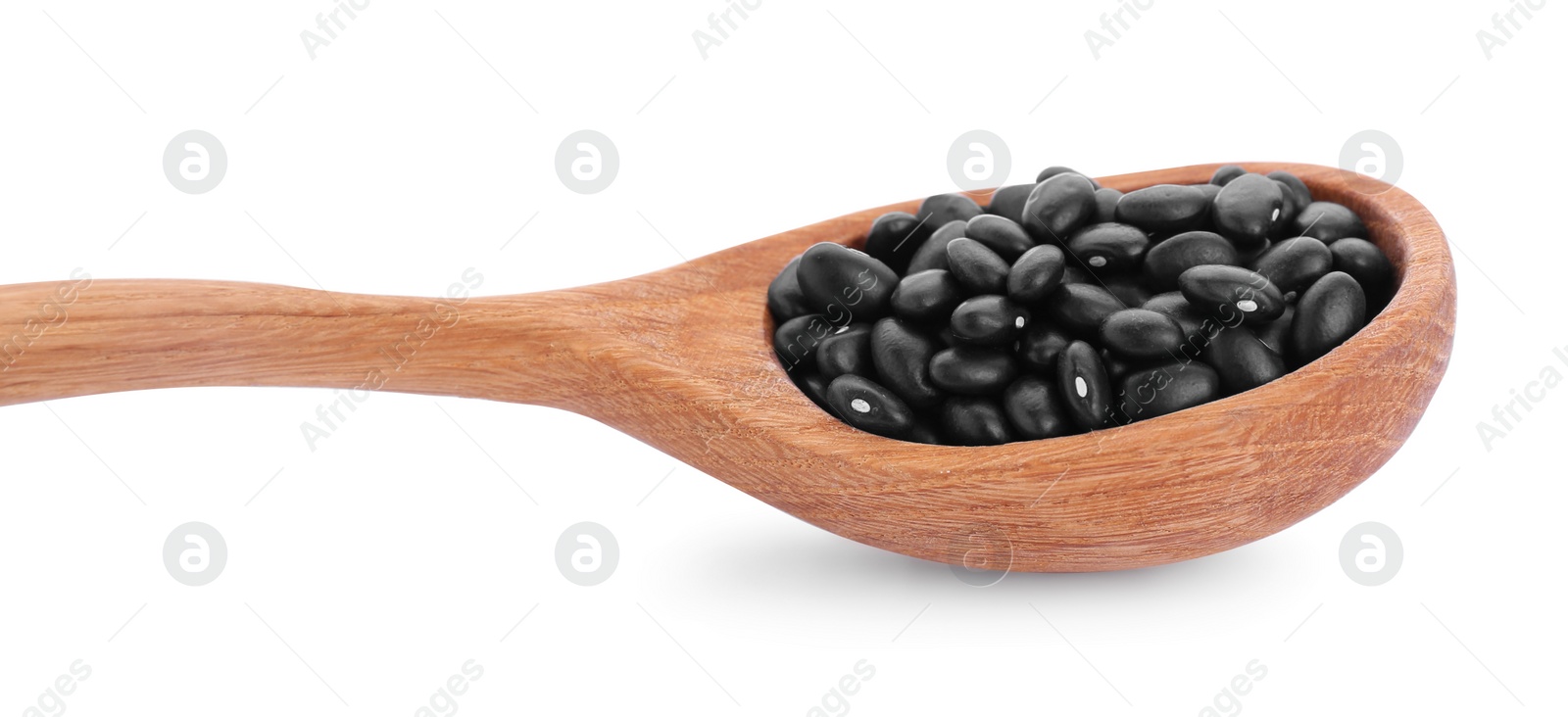Photo of Wooden spoon with raw kidney beans isolated on white