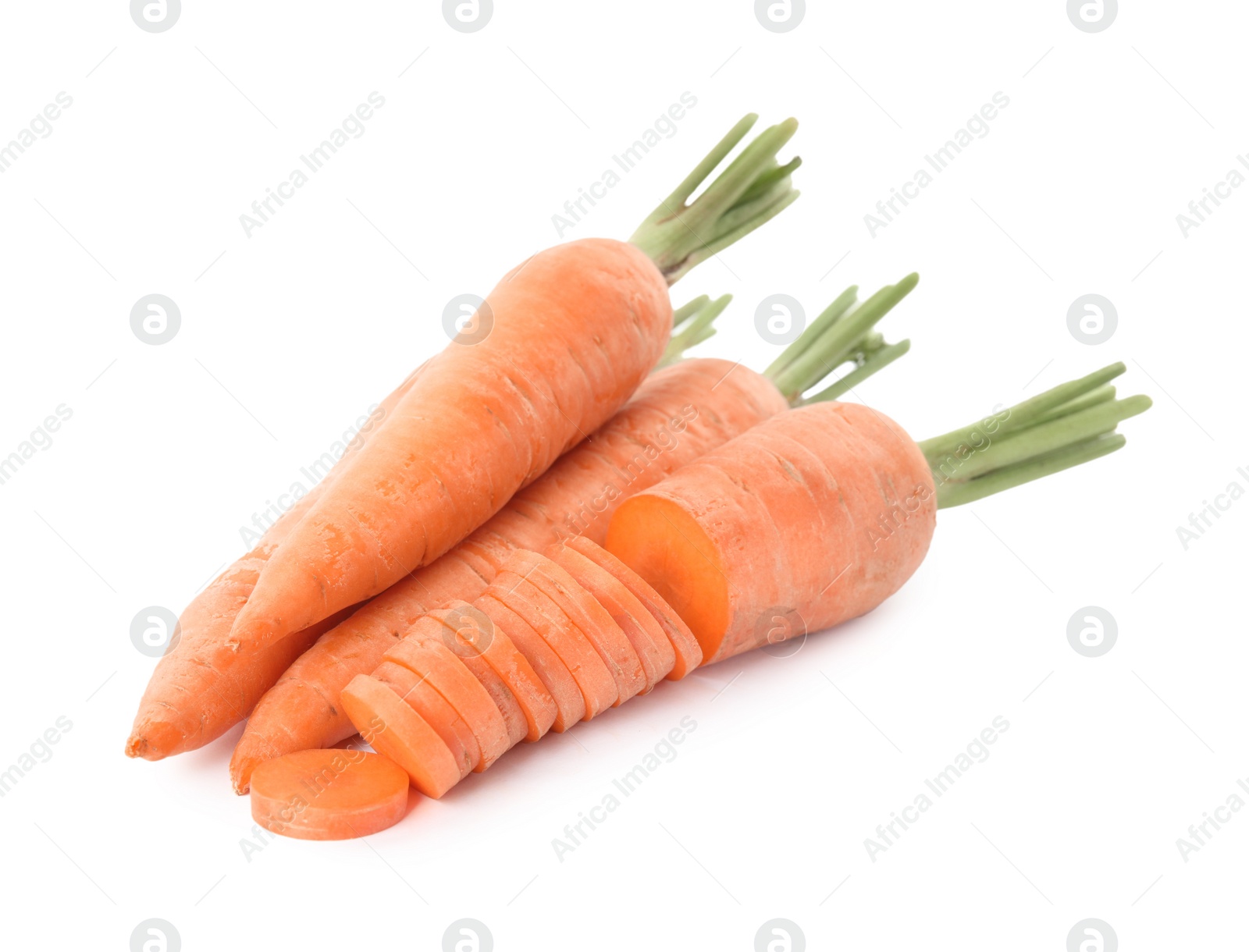 Photo of Whole and cut ripe carrots isolated on white