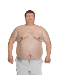 Photo of Portrait of overweight man posing on white background